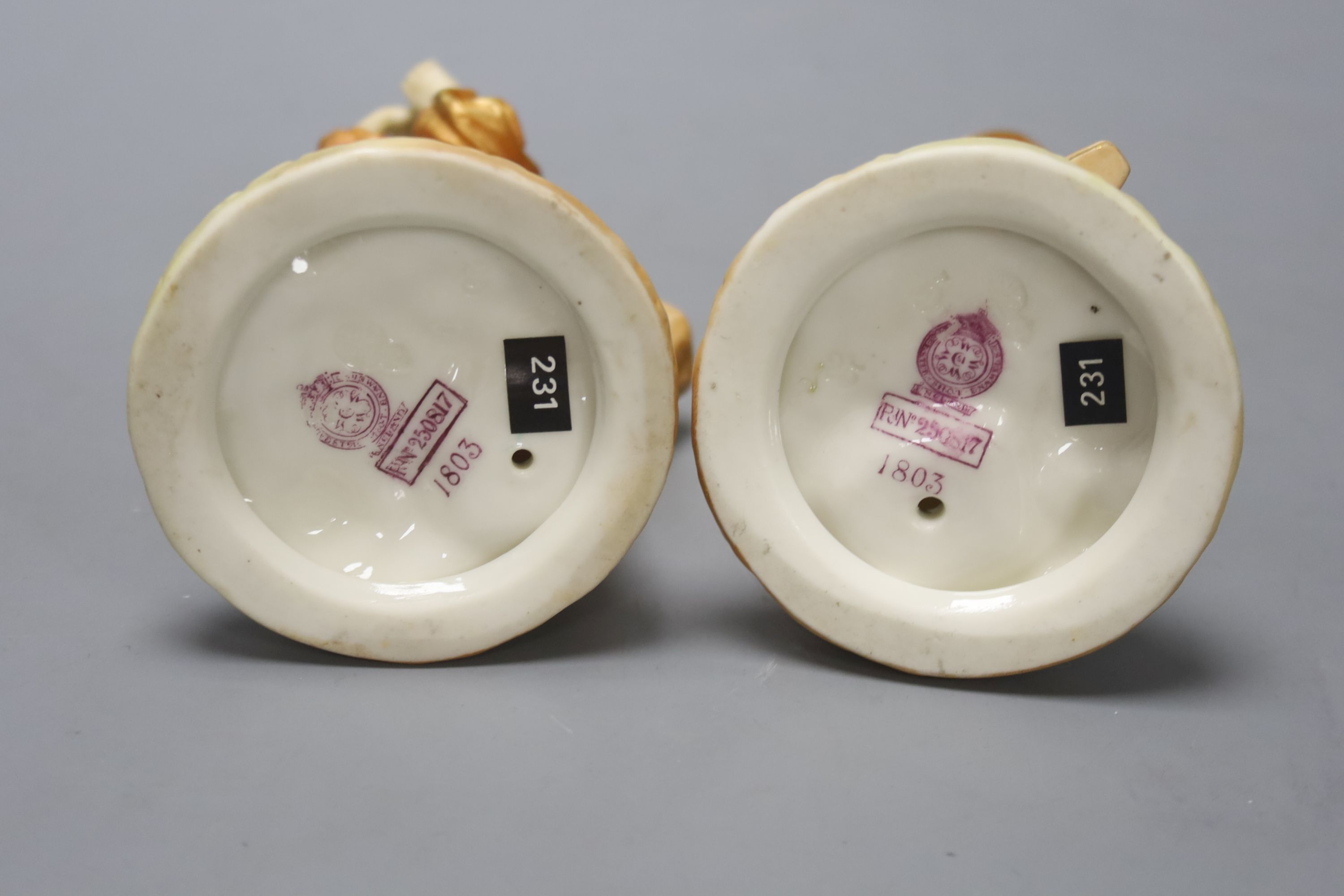 A pair of Royal Worcester figures of Stephen and companion, he with a flute and she with a tambourine, c.1890's, shot enamel mark, height 15cm